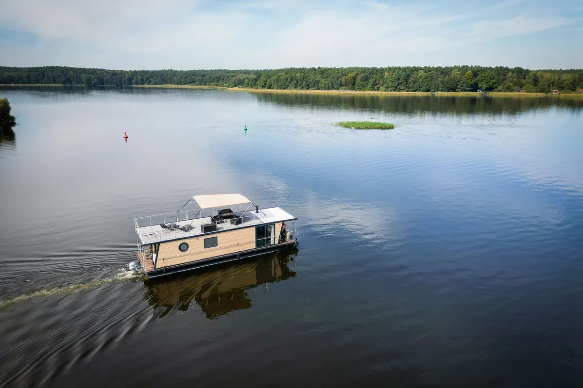 Exterior view of RedWine, a Woma D13 motorboat at Fürstenberg/Havel, Germany