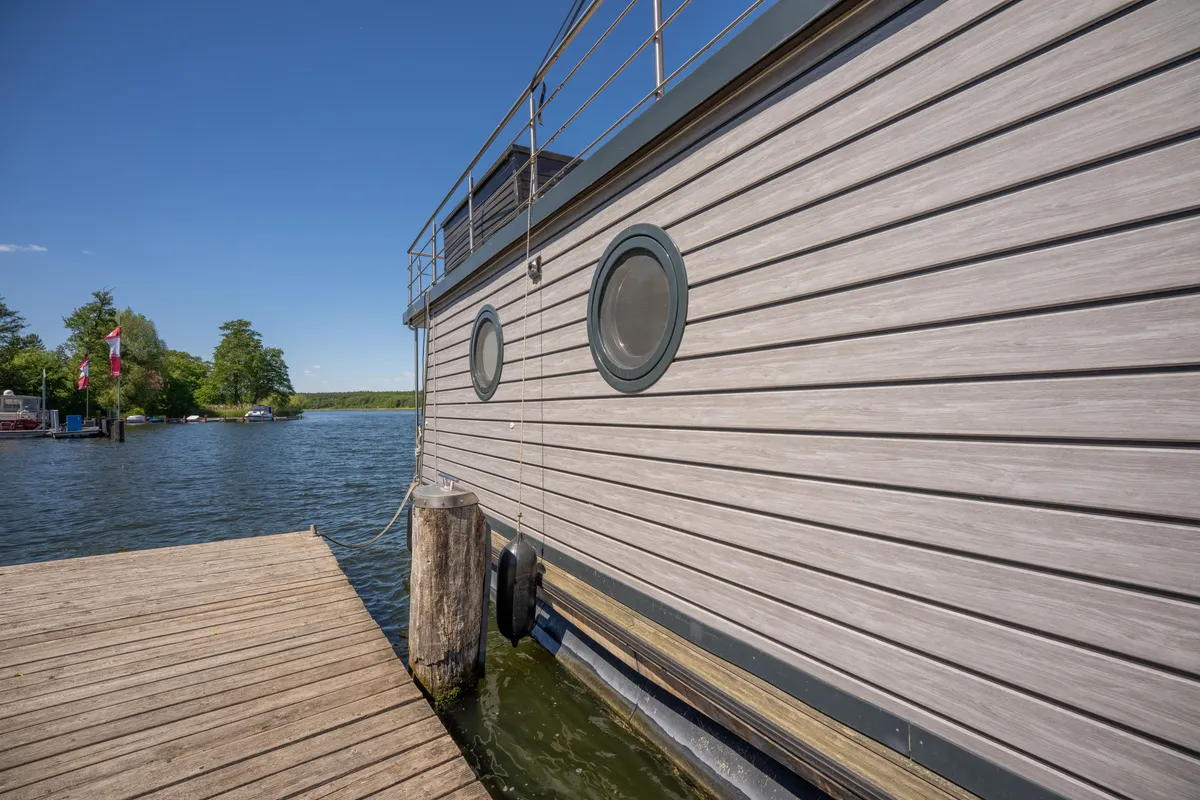 Exterior view of RedWine, a Woma D13 motorboat at Fürstenberg/Havel, Germany