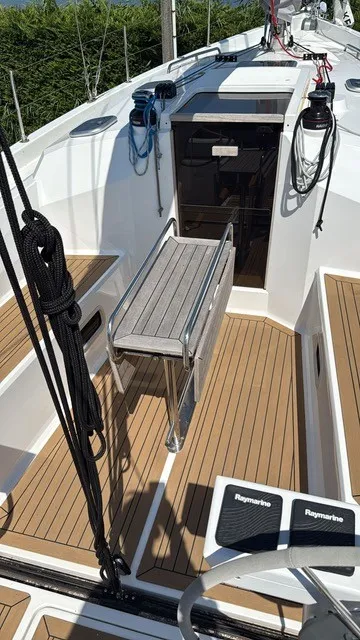 Deck of Guttiau, a Viko S 35 sailboat at Poltu Quatu, Italy