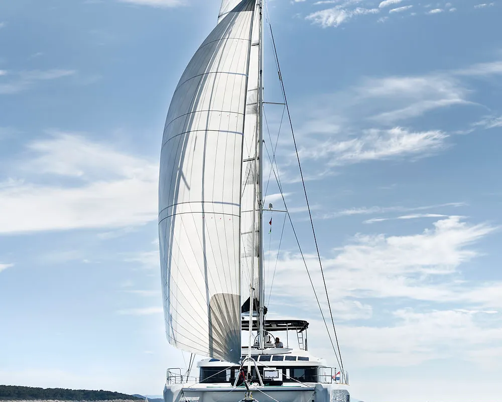 Exterior view of Emerald Gemini, a Lagoon 52 F OW catamaran at Grad Kaštela, Croatia