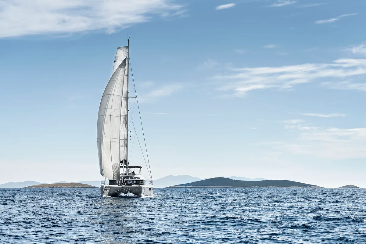 Exterior view of Emerald Gemini, a Lagoon 52 F OW catamaran at Grad Kaštela, Croatia