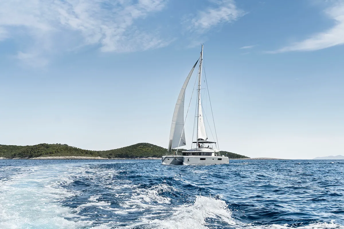 Exterior view of Emerald Gemini, a Lagoon 52 F OW catamaran at Grad Kaštela, Croatia