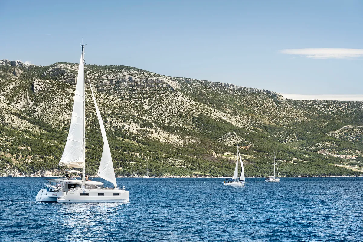 Exterior view of Emerald Gemini, a Lagoon 52 F OW catamaran at Grad Kaštela, Croatia