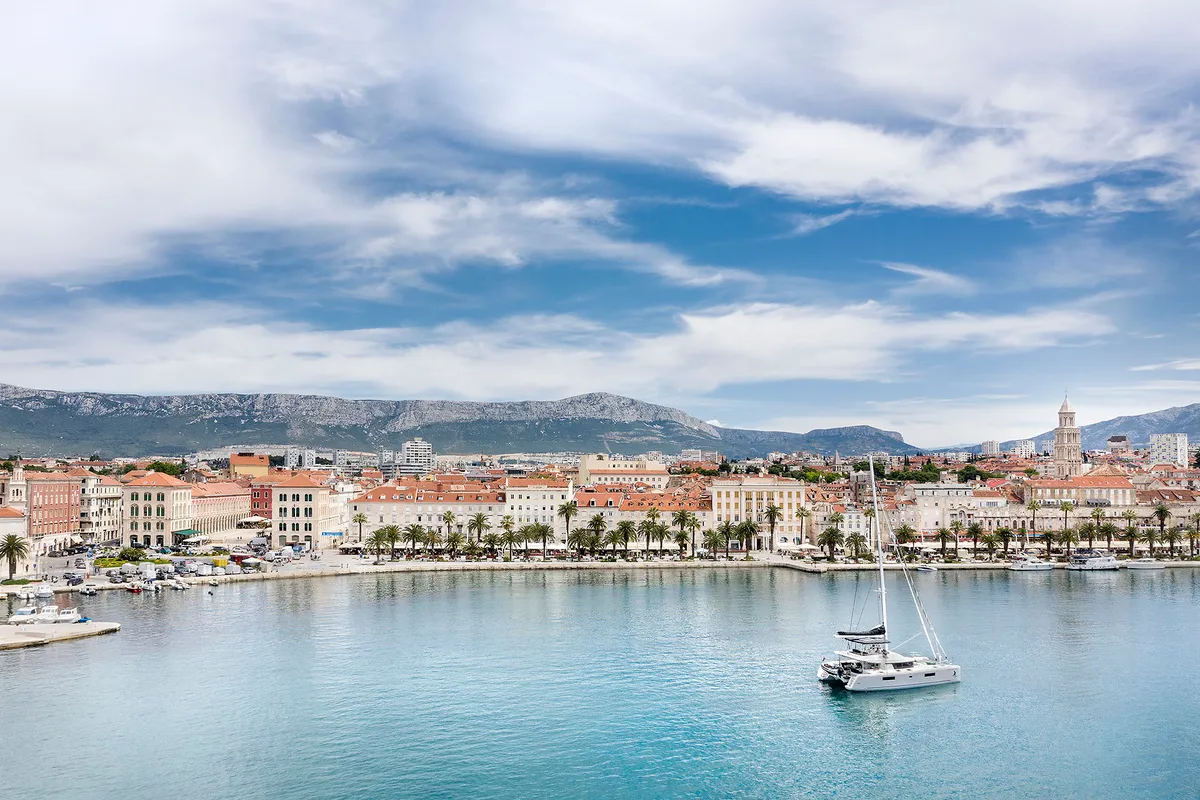 Exterior view of Emerald Gemini, a Lagoon 52 F OW catamaran at Grad Kaštela, Croatia