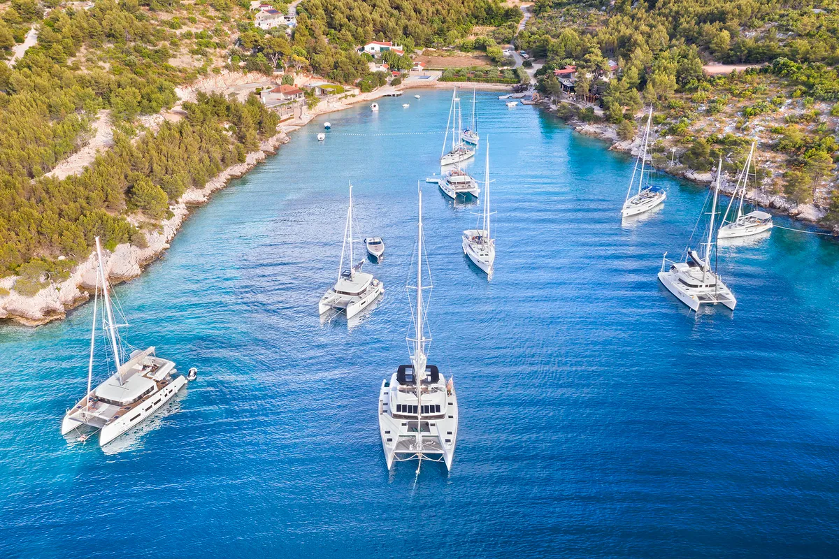 Exterior view of Emerald Gemini, a Lagoon 52 F OW catamaran at Grad Kaštela, Croatia