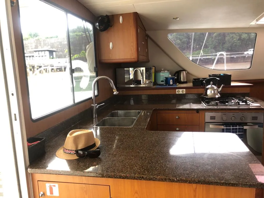 Galley of Kirsty B, a Custom Made Matrix Vision 450 catamaran at Mai Khao, Thailand