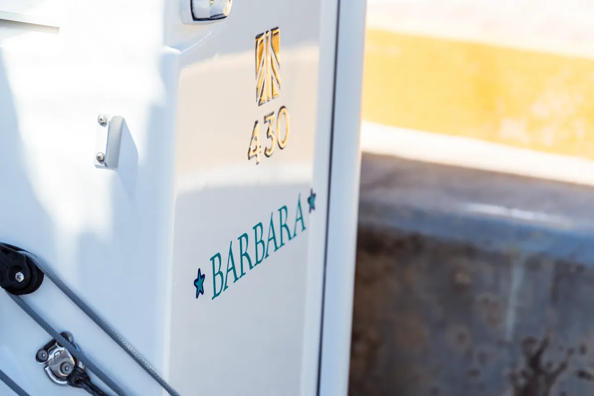 Exterior view of Barbara, a Dufour 430 sailboat at Olbia, Italy