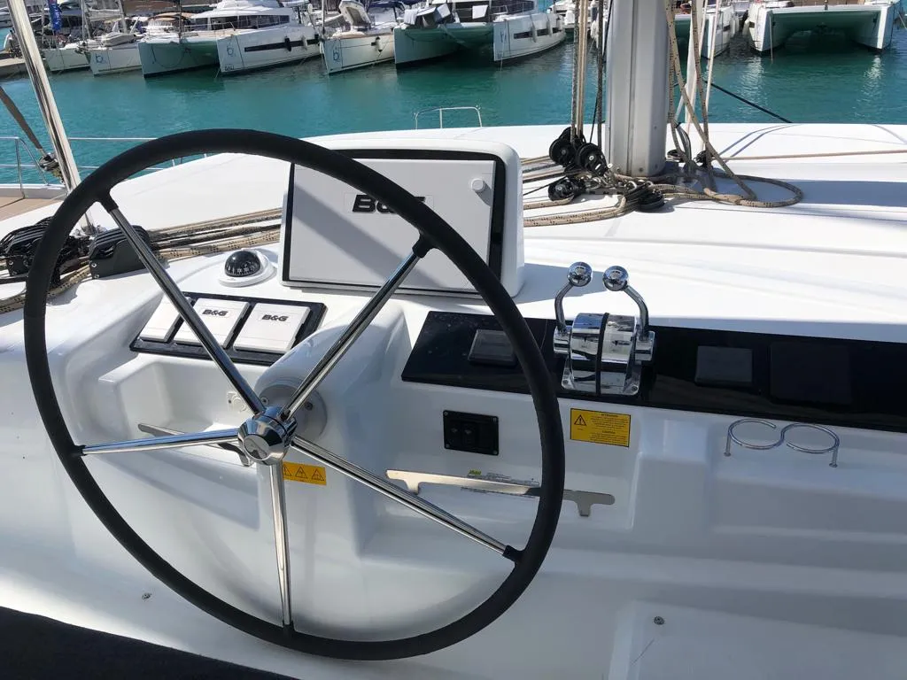 Cockpit of Oriana, a Lagoon 46 Fly catamaran at Capo d'Orlando, Italy