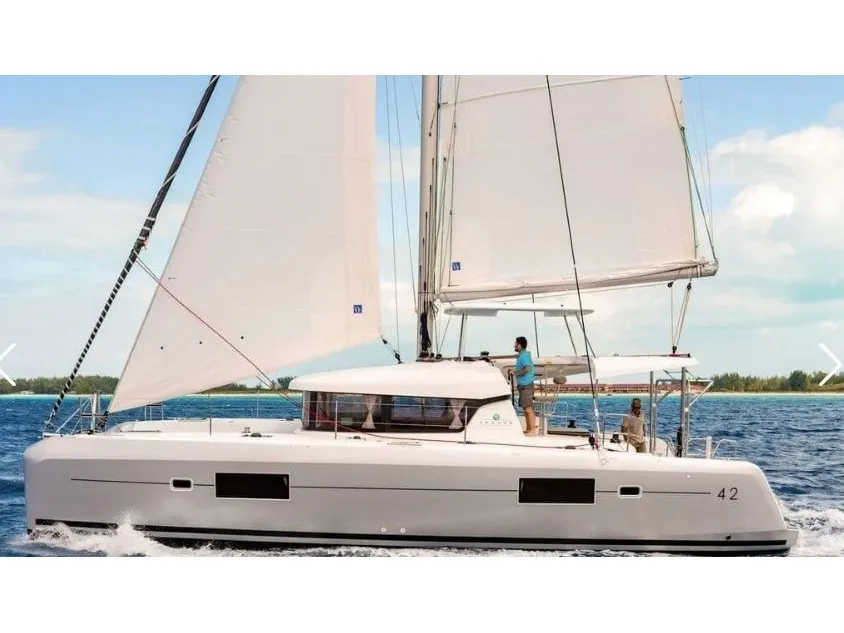 Exterior view of Lagoon 42, a catamaran at Agios Stefanos, Greece