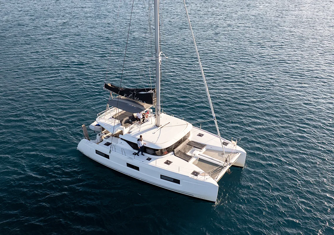 Exterior view of Kalisi Mou, a Lagoon 46 catamaran at Parikia, Greece