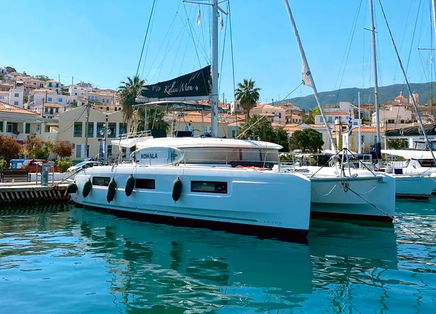 Exterior view of Kalisi Mou, a Lagoon 46 catamaran at Parikia, Greece