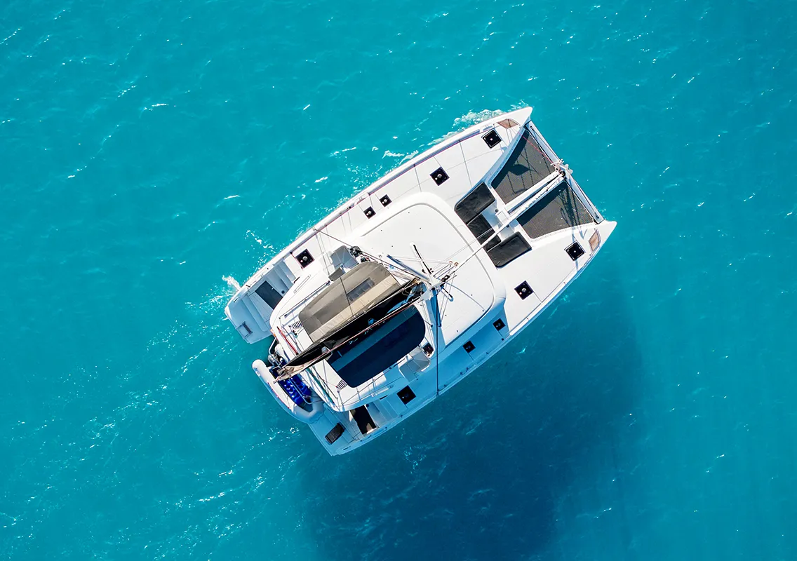 Exterior view of Kalisi Mou, a Lagoon 46 catamaran at Parikia, Greece