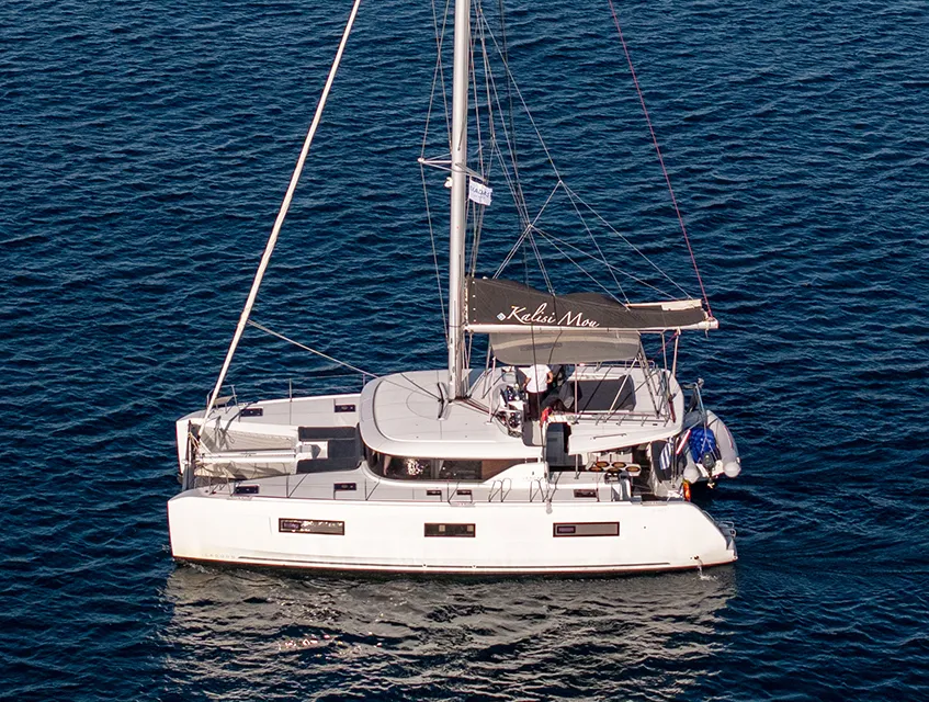 Exterior view of Kalisi Mou, a Lagoon 46 catamaran at Parikia, Greece