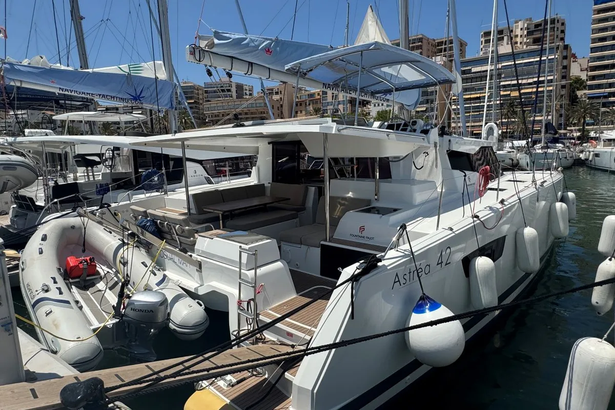 Exterior view of Rosual Mar 467/2025, a Fountaine Pajot Astrea 42 Quatuor catamaran at Palma de Mallorca, Spain
