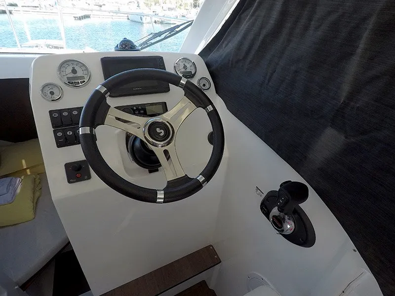 Cockpit of Lovre, a Beneteau Antares 8 OB motorboat at Grad Šibenik, Croatia