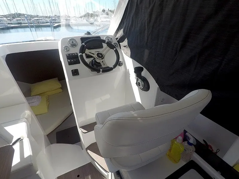 Cockpit of Lovre, a Beneteau Antares 8 OB motorboat at Grad Šibenik, Croatia