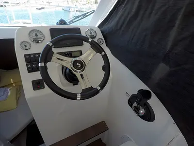 Cockpit of Lovre, a Beneteau Antares 8 OB motorboat at Grad Šibenik, Croatia