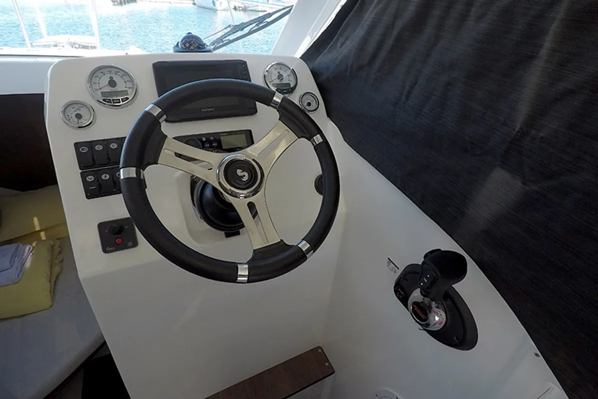Cockpit of Lovre, a Beneteau Antares 8 OB motorboat at Grad Šibenik, Croatia