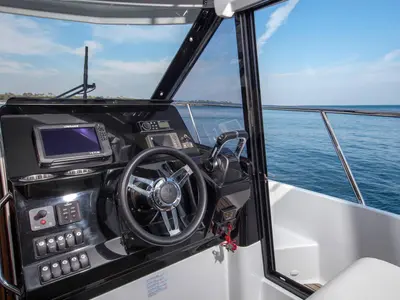 Cockpit of Sea King, a Jeanneau Merry Fisher 1095 Fly motorboat at Pula, Croatia