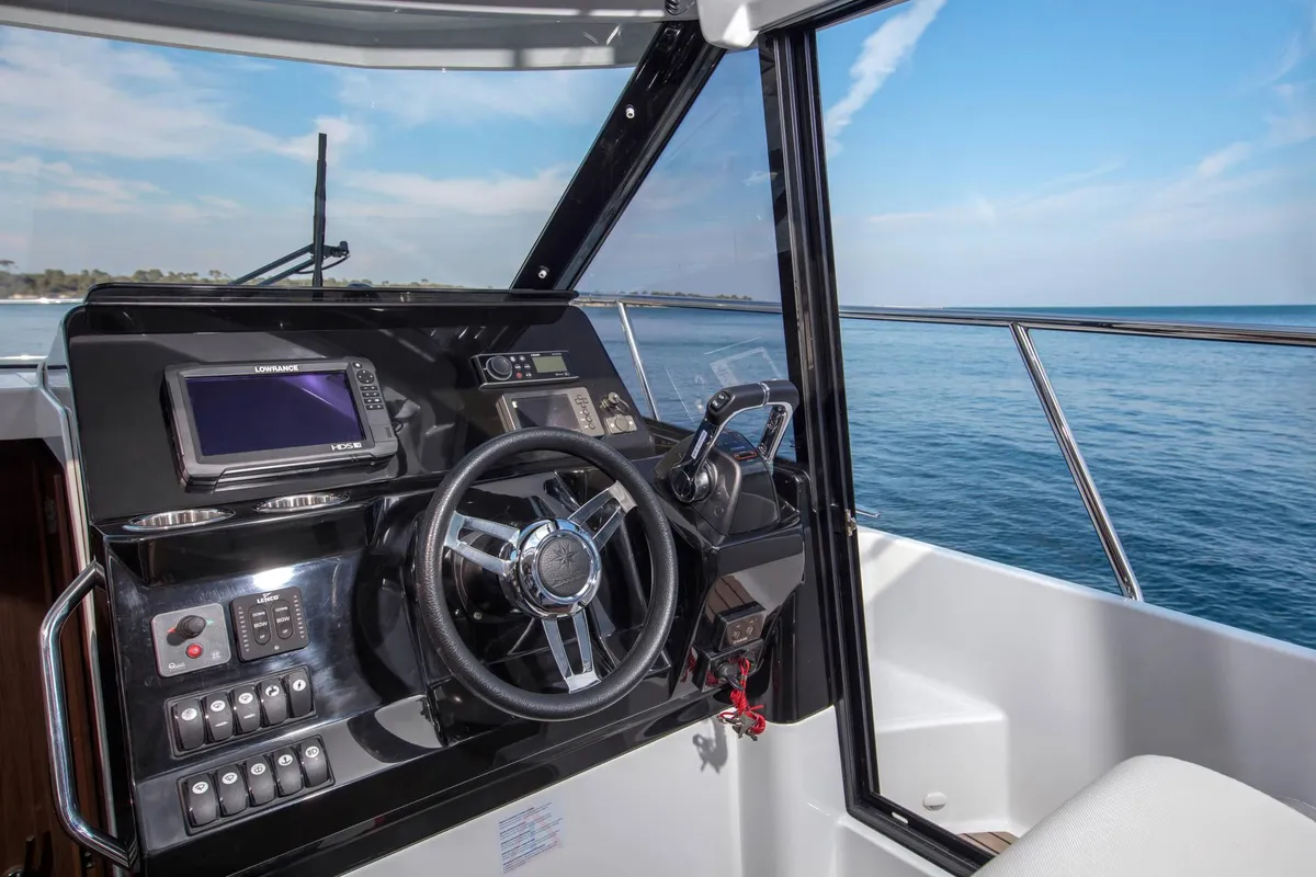 Cockpit of Sea King, a Jeanneau Merry Fisher 1095 Fly motorboat at Pula, Croatia