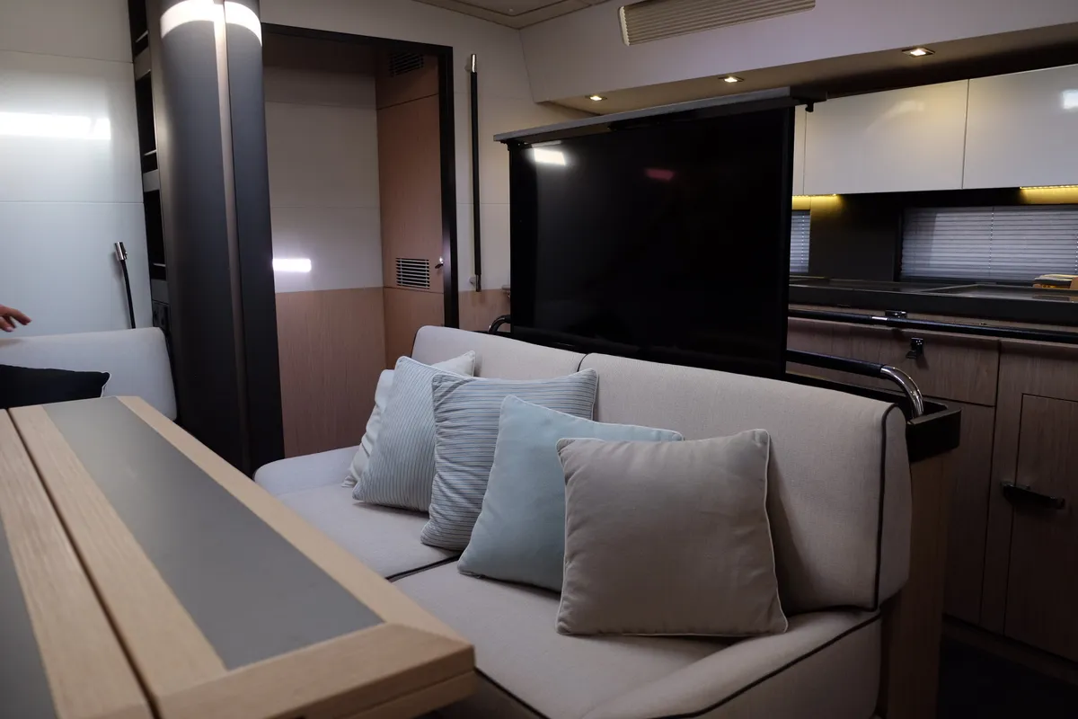 Salon of Premium +, a Beneteau Oceanis Yacht 62 sailboat at Rosignano Solvay, Italy