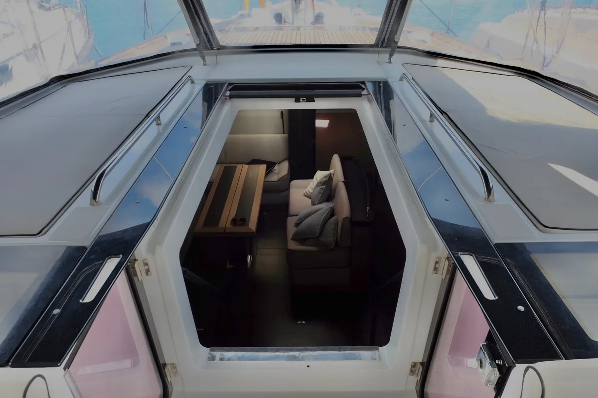Salon of Premium +, a Beneteau Oceanis Yacht 62 sailboat at Rosignano Solvay, Italy