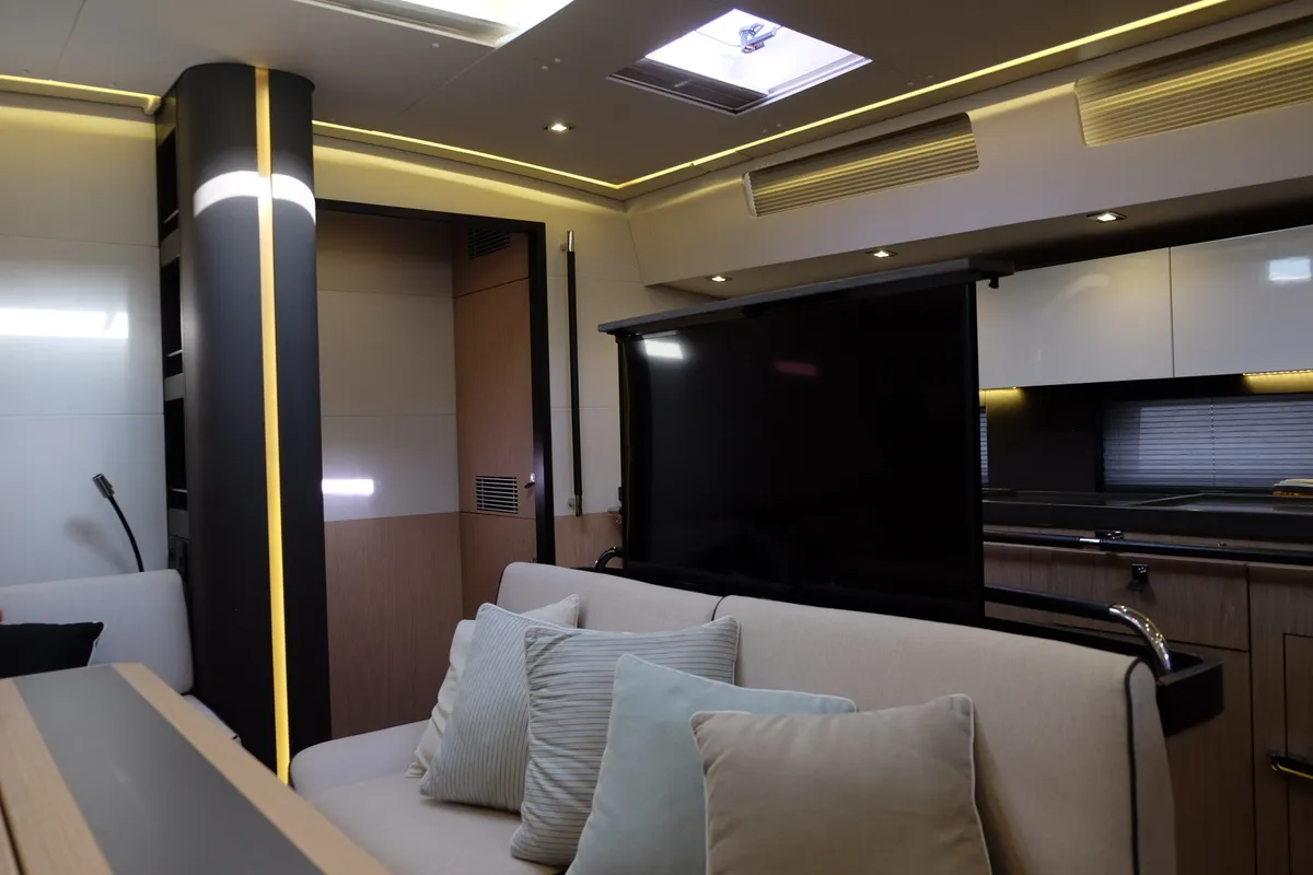 Salon of Premium +, a Beneteau Oceanis Yacht 62 sailboat at Rosignano Solvay, Italy