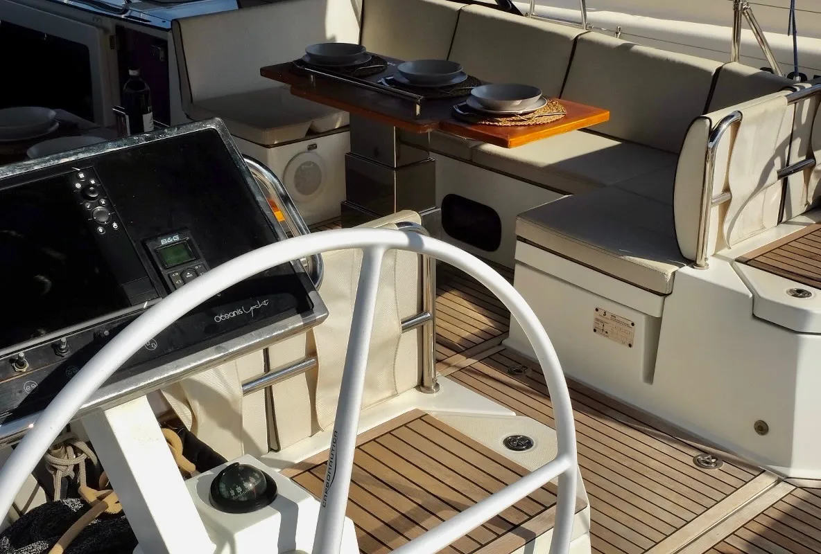Cockpit of Premium +, a Beneteau Oceanis Yacht 62 sailboat at Rosignano Solvay, Italy