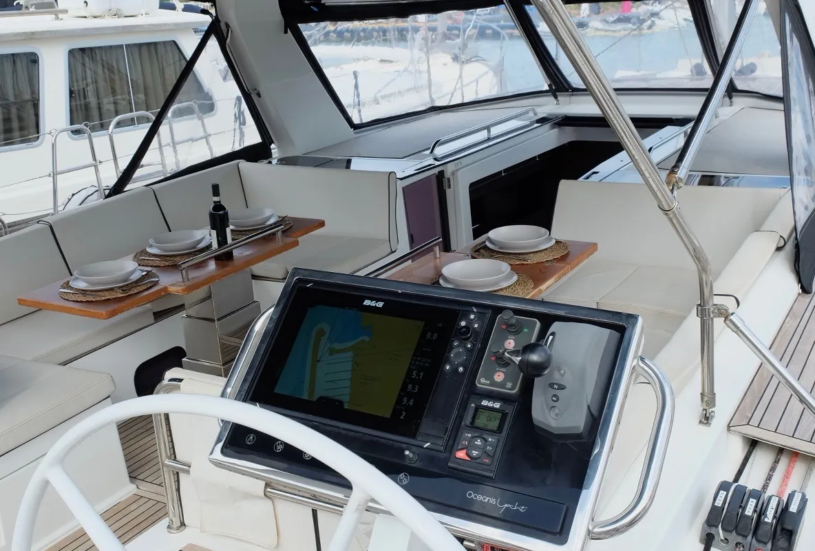 Cockpit of Premium +, a Beneteau Oceanis Yacht 62 sailboat at Rosignano Solvay, Italy