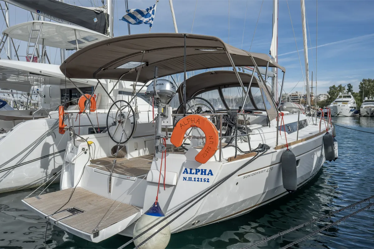 Exterior view of Alpha, a Jeanneau Sun Odyssey 479 sailboat at Benitses, Greece