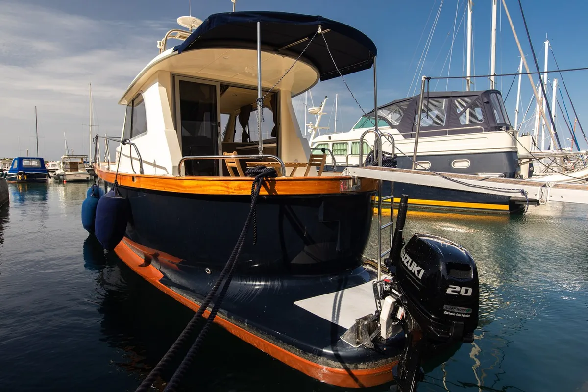 Exterior view of Paola, a Brodoremont Punat Adria Mare 38 motor yacht at Punat, Croatia