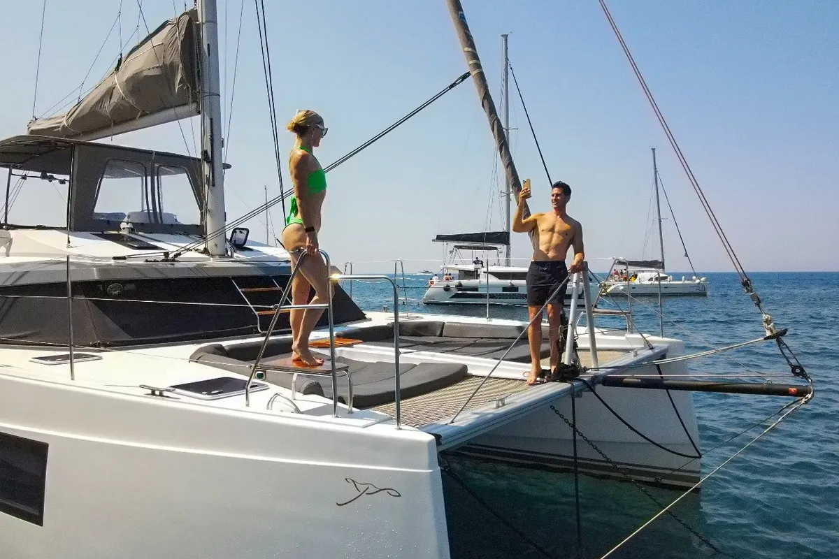 Exterior view of IQ, a Nautitech 46 Fly catamaran at Athens, Greece