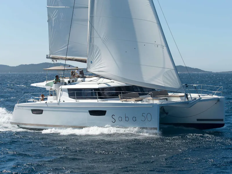 Exterior view of Princess Aphrodite, a Fountaine Pajot Saba 50 catamaran at Grad Trogir, Croatia