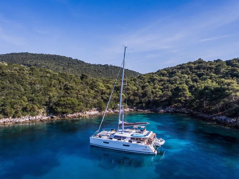 Exterior view of Princess Aphrodite, a Fountaine Pajot Saba 50 catamaran at Grad Trogir, Croatia