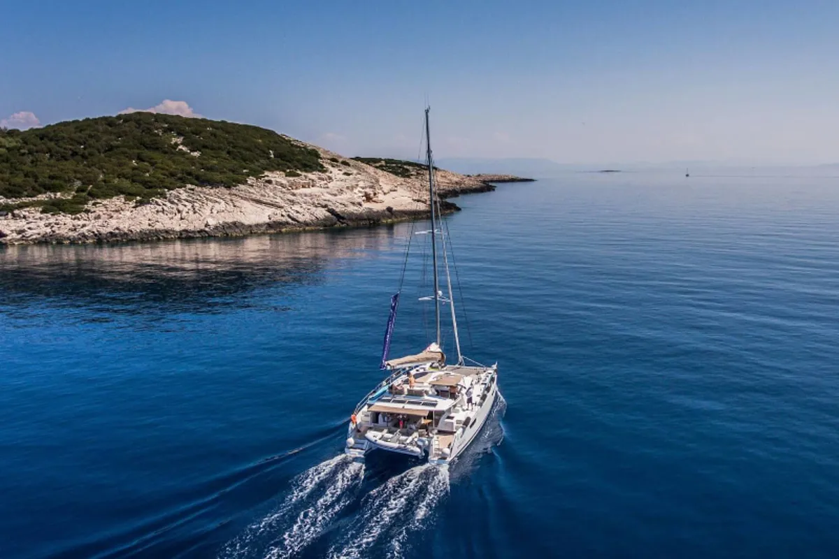 Exterior view of Princess Aphrodite, a Fountaine Pajot Saba 50 catamaran at Grad Trogir, Croatia