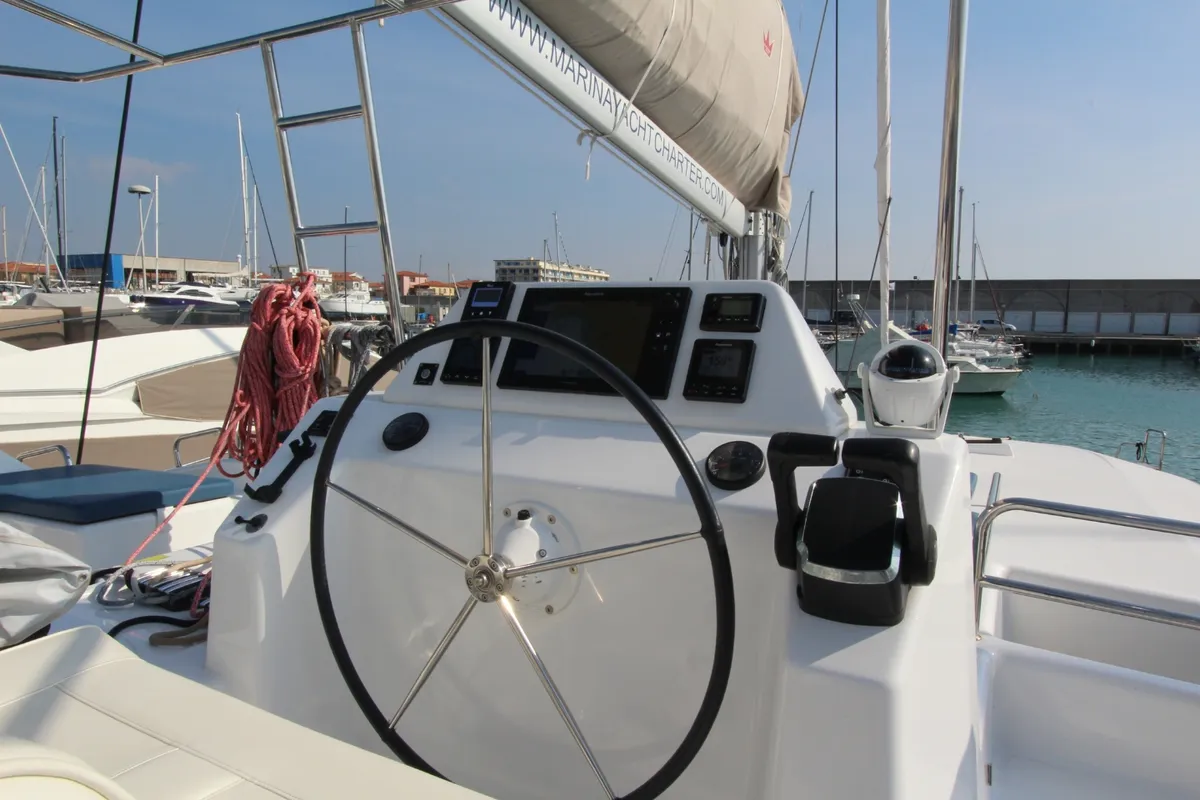 Cockpit of Lublu, a Dufour 48 Catamaran catamaran at Olbia, Italy