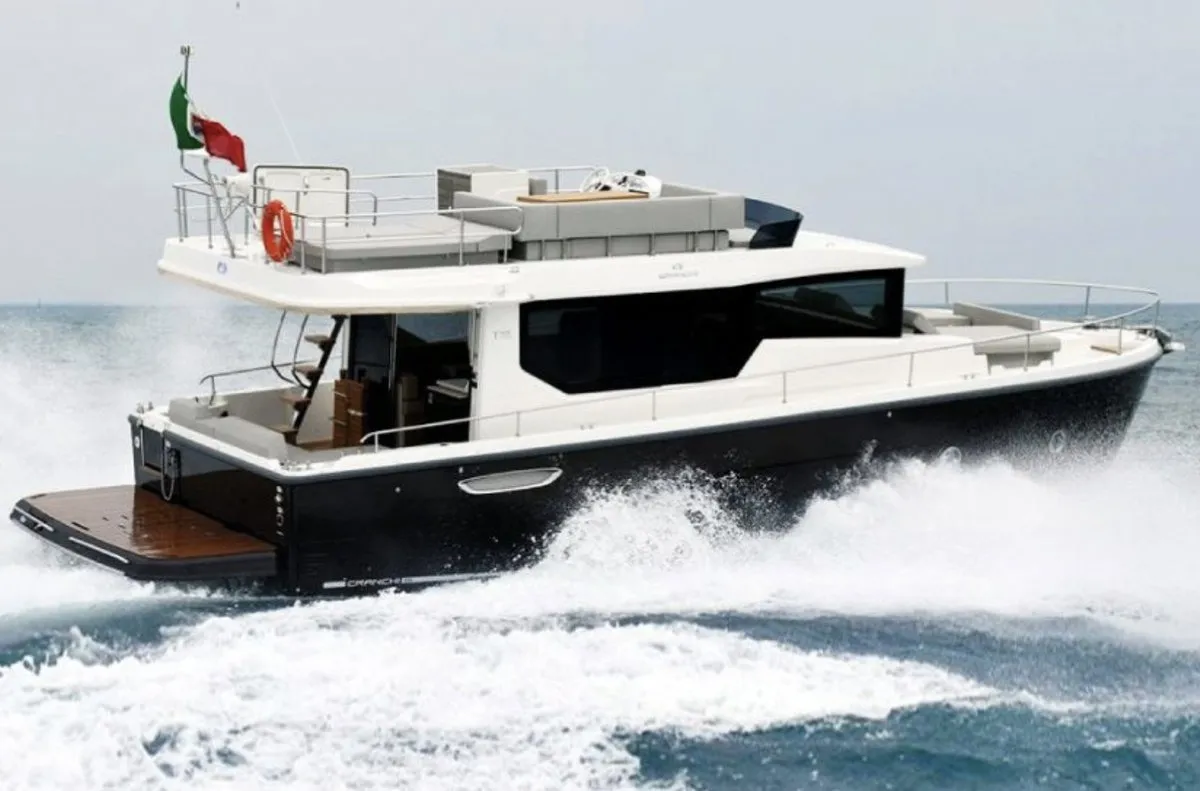 G&K2, a Cranchi T43 Eco Trawler motorboat at Cannigione, Italy