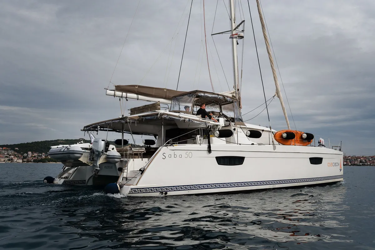 Exterior view of Royal Cracow, a Fountaine Pajot Saba 50 catamaran at Grad Trogir, Croatia