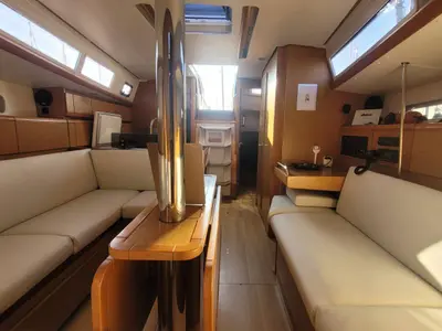 Salon of Corail, a Jeanneau Sun Odyssey 379 sailboat at Saint-Cast-le-Guildo, France