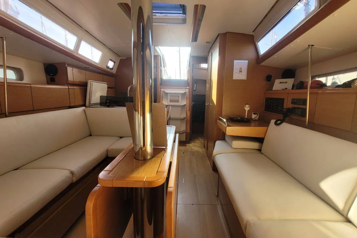 Salon of Corail, a Jeanneau Sun Odyssey 379 sailboat at Saint-Cast-le-Guildo, France