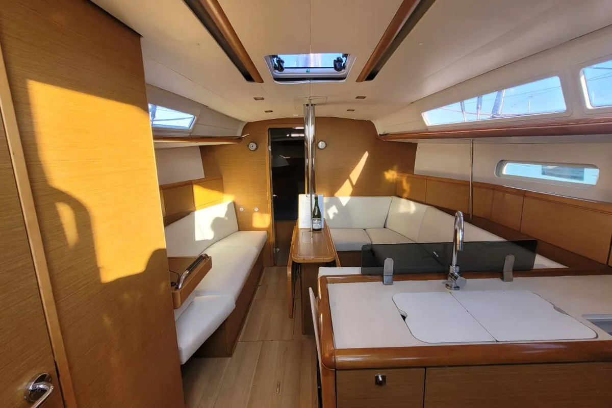 Salon of Corail, a Jeanneau Sun Odyssey 379 sailboat at Saint-Cast-le-Guildo, France