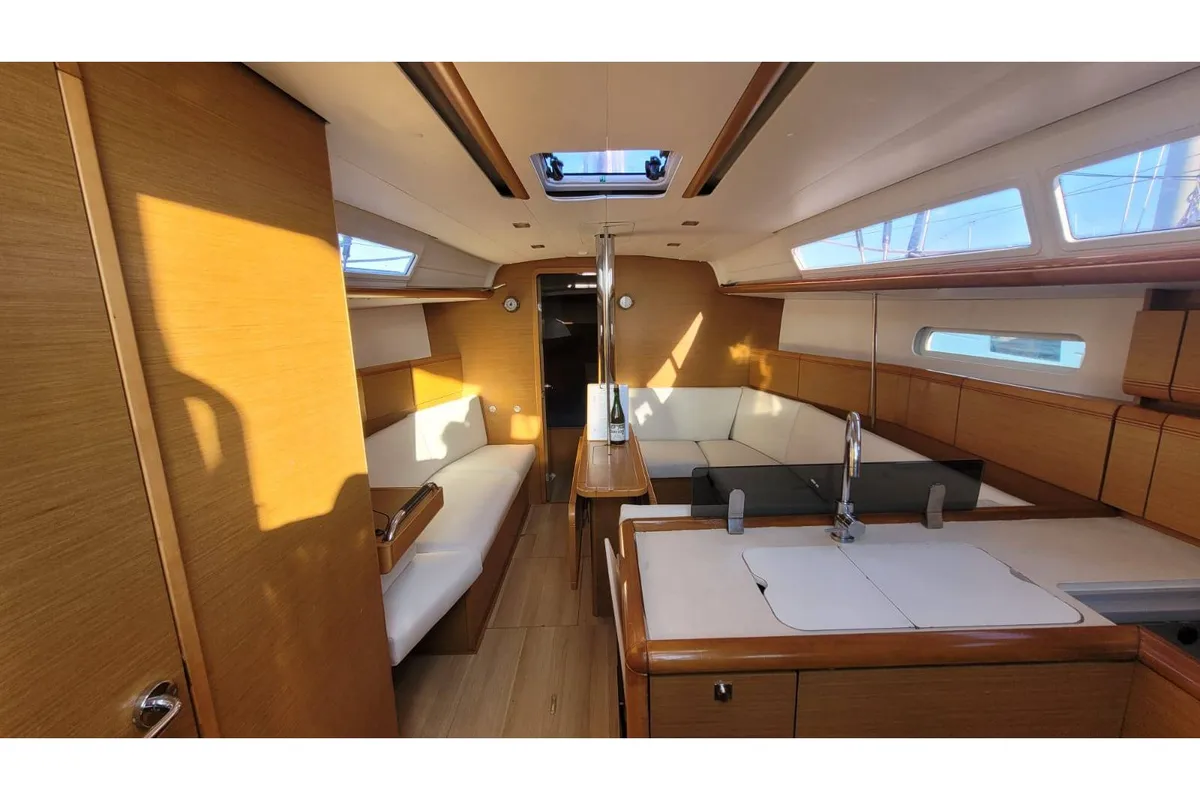 Salon of Corail, a Jeanneau Sun Odyssey 379 sailboat at Saint-Cast-le-Guildo, France