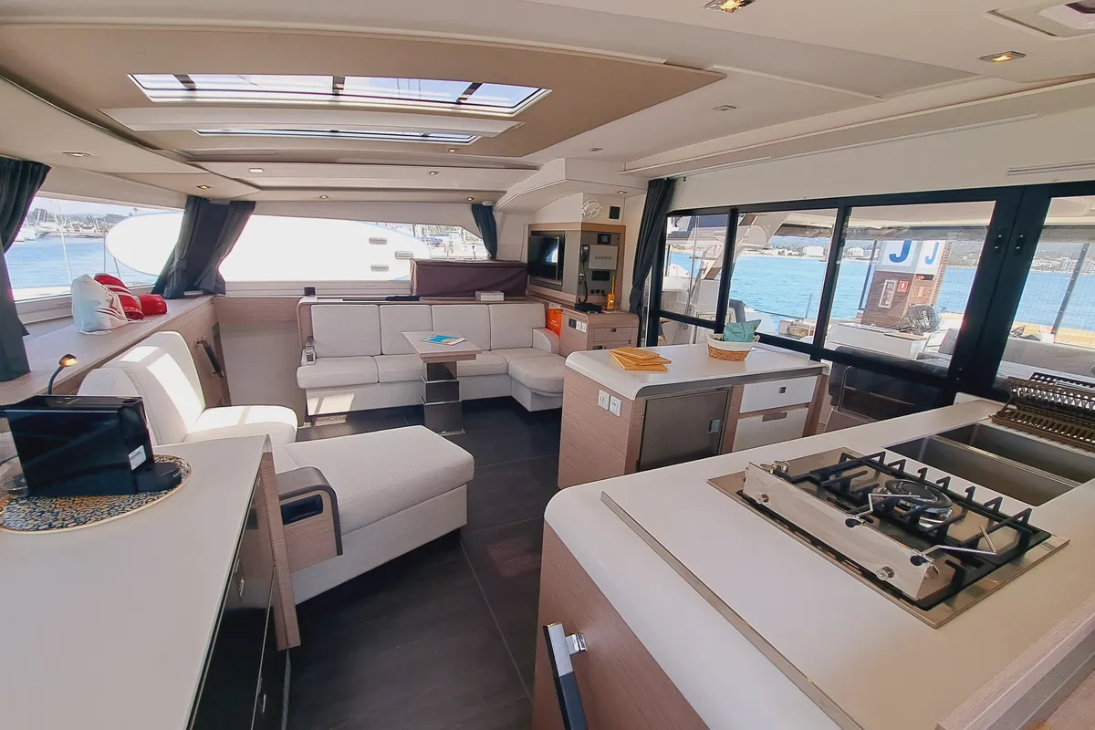 Salon of Le Grand Bogavant, a Fountaine Pajot Aura 51 catamaran at Sant Antoni de Portmany, Spain