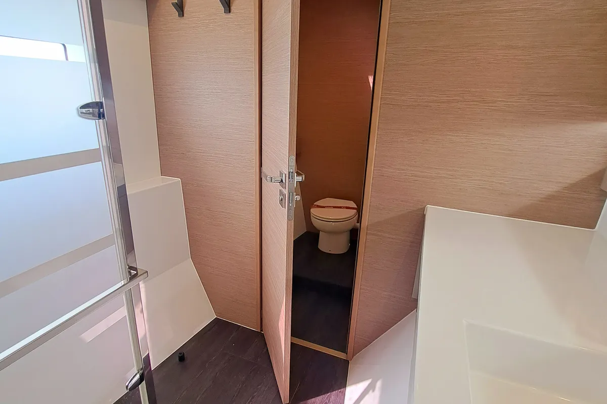 Head on Le Grand Bogavant, a Fountaine Pajot Aura 51 catamaran at Sant Antoni de Portmany, Spain