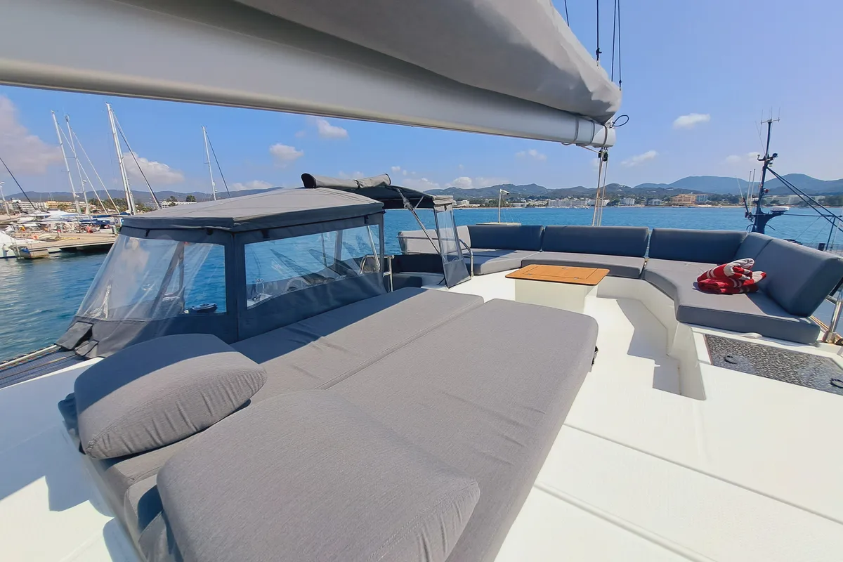 Deck of Le Grand Bogavant, a Fountaine Pajot Aura 51 catamaran at Sant Antoni de Portmany, Spain