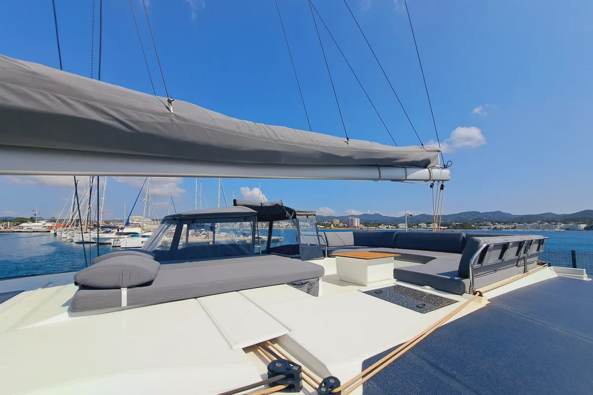 Deck of Le Grand Bogavant, a Fountaine Pajot Aura 51 catamaran at Sant Antoni de Portmany, Spain