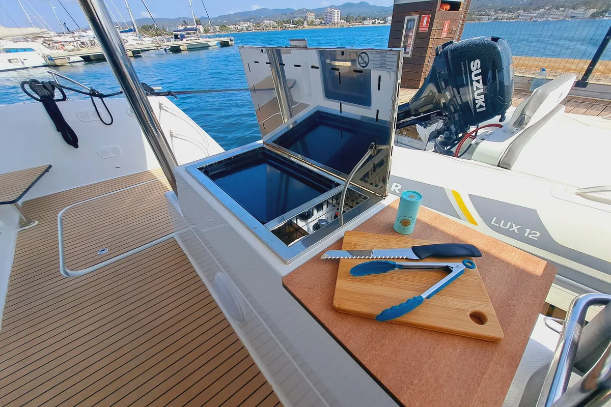 Le Grand Bogavant, a Fountaine Pajot Aura 51 catamaran at Sant Antoni de Portmany, Spain