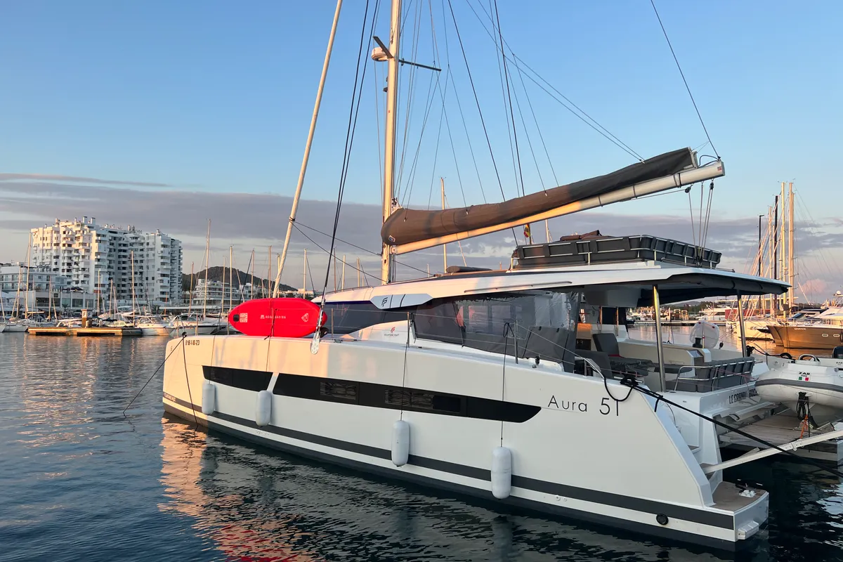 Exterior view of Le Grand Bogavant, a Fountaine Pajot Aura 51 catamaran at Sant Antoni de Portmany, Spain