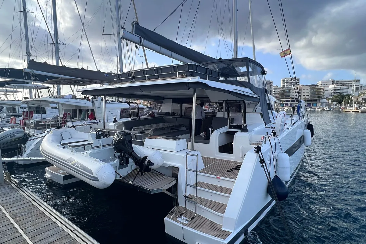 Exterior view of Le Grand Bogavant, a Fountaine Pajot Aura 51 catamaran at Sant Antoni de Portmany, Spain