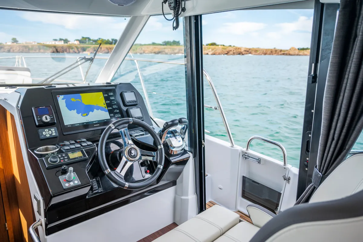 Cockpit of ELA, a Beneteau Antares 11 OB motorboat at Grad Pula, Croatia